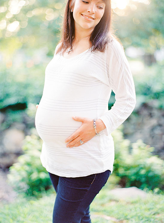 Maternity photos captured at the same spot where her husband proposed