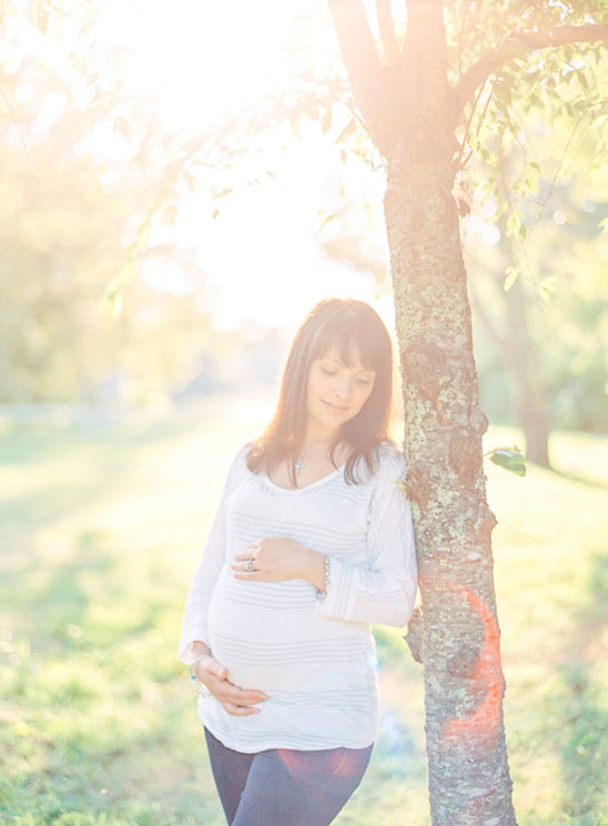 Maternity photos captured at the same spot where her husband proposed