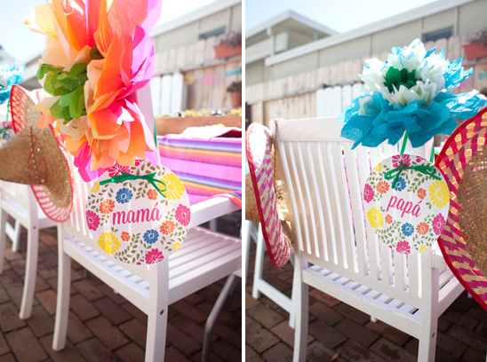 Fun signs on the chairs of mom-to-be and dad-to-be