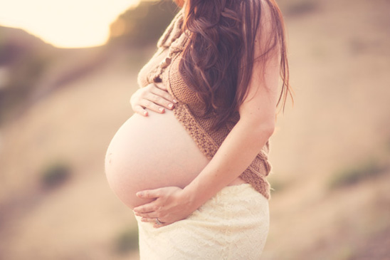 Romantic maternity photos with a vintage feel