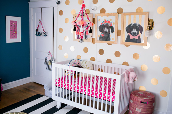 Fun, colorful nursery in teal, pink, black, and gold