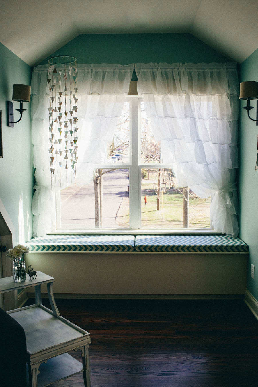 Mint Nursery with Geometric Patterns and Woodland Details